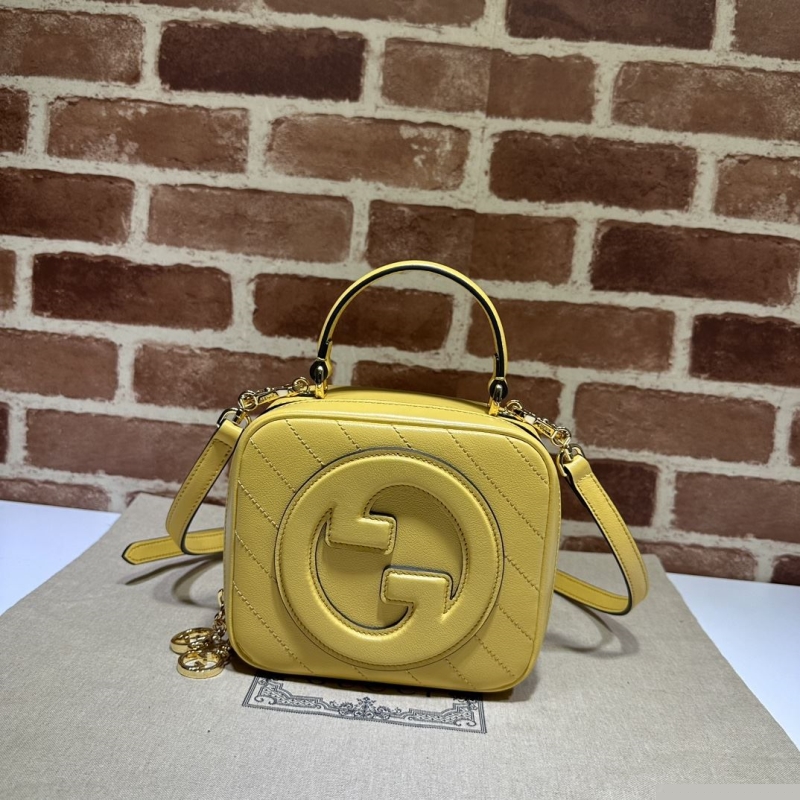 G*u*i top handle bags